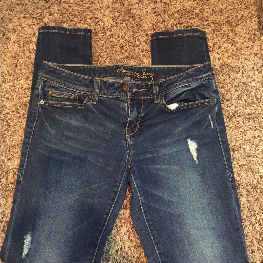 Blue distressed jeans